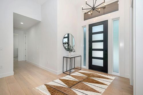 nuLOOM Kali Shaggy Diamond Tassel Area Rug, 5x8, Light Brown in Modern White Entryway