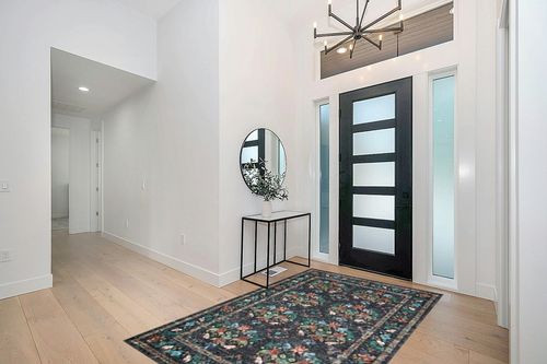 Loloi Rifle Paper Co. x Courtyard Charcoal 5'-0" x 7'-6" Area Rug in Modern White Entryway