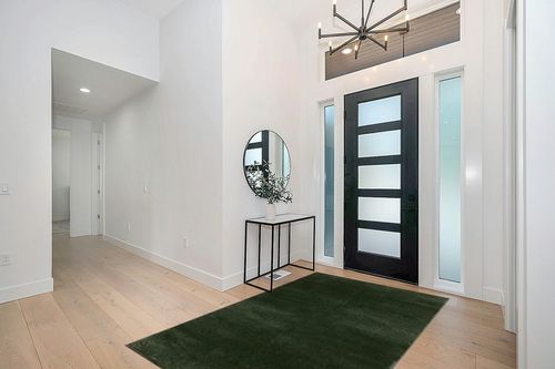 SAFAVIEH Revive Collection Area Rug - 5'3" x 7'7", Green, Solid Design, Non-Shedding & Easy Care, Ideal for High Traffic Areas in Living Room, Bedroom (REV102Y) in Modern White Entryway