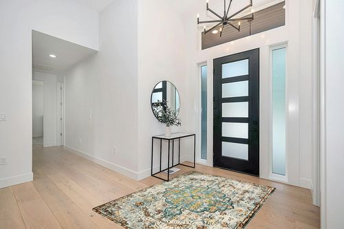 Pastel Teal Large Dining Room Rug in Modern White Entryway