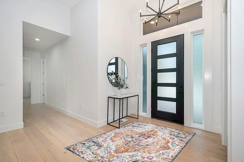 Bohemian Stain Resistant, Non Slip Area Rug in Modern White Entryway