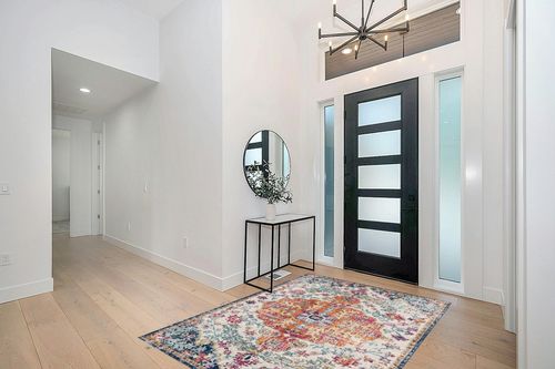 Orange/Navy Traditional Living Room Area Rug in Modern White Entryway