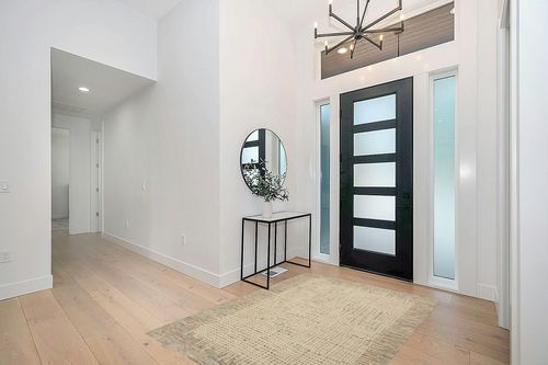Tufted Wool Beige Area Rug Dovecove Rug Size: Rectangle 5'3" x 7'3" in Modern White Entryway