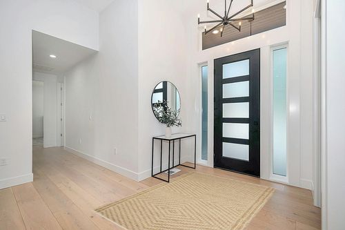 Angela Rose x Loloi 5'0" 7'0" Natural/Ivory Colton CON-04 Area Rug in Modern White Entryway