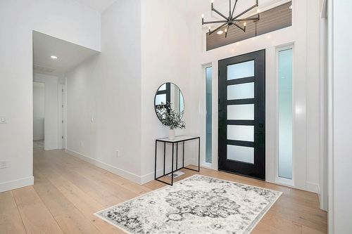 Artistic Weavers Odelia Vintage Bohemian Area Rug,5'3" x 7'3",Black in Modern White Entryway