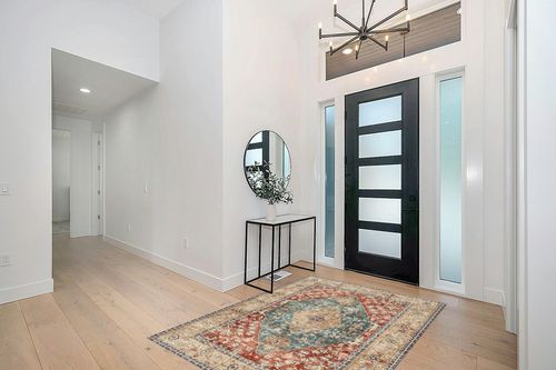 Valenrug Area Rug 5x7 - Stain Resistant Lightweight Washable Rug, Anti-Skid Rugs for Living Room, Vintage Tribal Area Rug(Orange/Red, 5'x7') in Modern White Entryway
