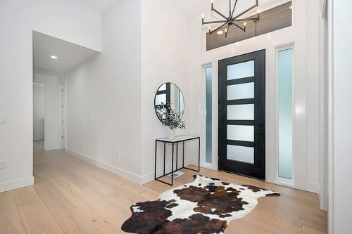Tricolor Cowhide Rug Classic Brown, Black and White Color Mix, Natural Leather Hide, Area Rug (5x7 ft) in Modern White Entryway