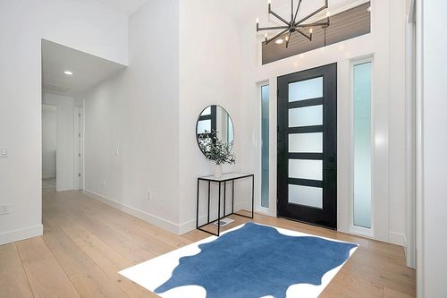 SAFAVIEH Cow Hide Collection Area Rug - 5' x 7', Blue, Genuine Natural Suede Leather Rustic Design, Non-Shedding & Easy Care, Ideal for High Traffic Areas in Living Room, Bedroom (COH800M) in Modern White Entryway