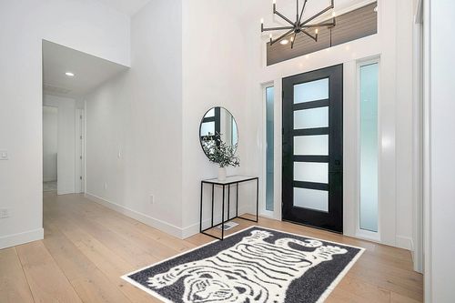Hauteloom Tilos Moroccan Farmhouse Living Room Bedroom Nursery Shag Area Rug - Shaggy Carpet - Tiger Pattern - High Plush Pile - Dark Grey, Charcoal, Beige, Cream - 5'3" x 7' in Modern White Entryway