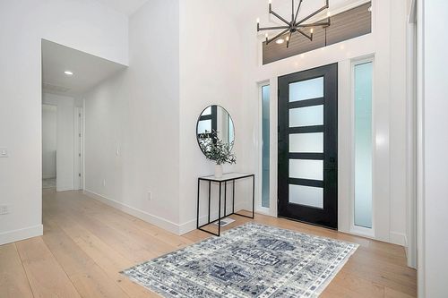 Rugs America Gallagher Collection GL55F Inky Sundara Transitional Vintage Area Rug 5'3" x 7' in Modern White Entryway