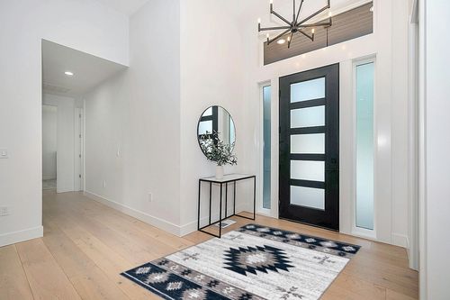 Well Woven Southwestern Rodrigo 5'3" x 7'3" Blue Area Rug in Modern White Entryway