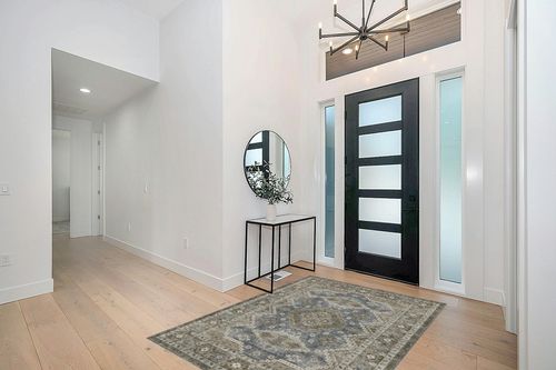 Rugland 9x12 Area Rug - Stain Resistant Washable Rug, Anti Slip Backing Rugs for Living Room, Vintage Tribal Area Rugs (TPR07-Green, 9'x12') in Modern White Entryway
