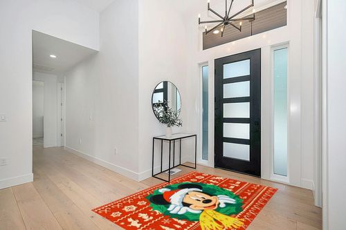 Gertmenian Kids Playroom & Game Room Carpet Disney Mickey Mouse Childrens Rug Kids Home Decor, Area Carpet for Boys & Girls Playroom, Bedroom 54x78 Large, Red & Green M&M Holiday Wreath, 46689 in Modern White Entryway