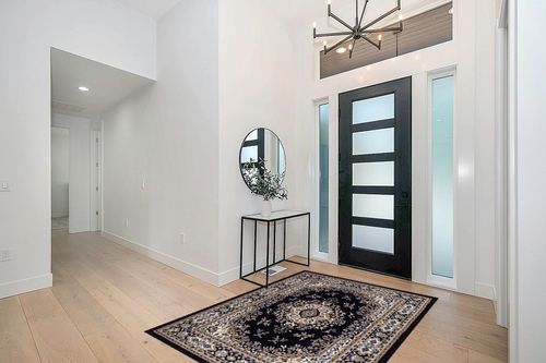 Home Dynamix Premium Sakarya Traditional Medallion Area Rug, Navy Blue/Brown, 5'2"x7'4" in Modern White Entryway