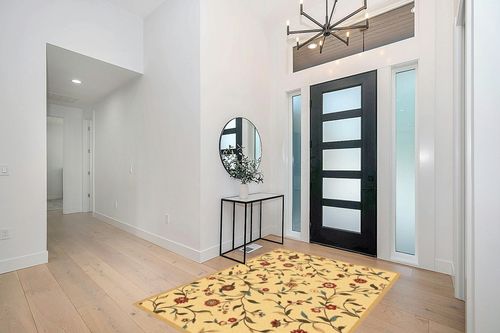 Ottomanson Ottohome Collection Non-Slip Rubberback Floral Leaves Design 5x7 Indoor Area Rug, 5' x 6'6", Beige in Modern White Entryway