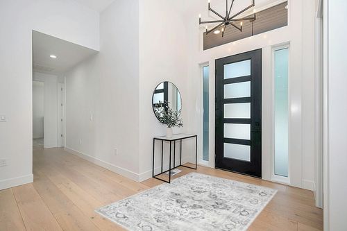 xilixili 5x7 Area Rugs with Non Slip Backing - Stain Resistant Washable Rugs for Living Room，Bedroom & Dining Room，Vintage Printed Home Decor Rug (Ivory/Gray,5'x7') in Modern White Entryway