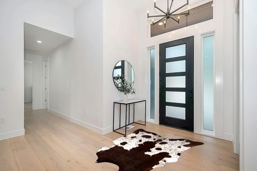Quenlife Cowhide Rug for Living Room, Soft Cow Print Rug Cute Cow Rug for Bedroom, Cow Hide Rug Faux Animal Rug for Western Home Theme Room Decor, White and Browm, 5.2 x 6.2 ft in Modern White Entryway