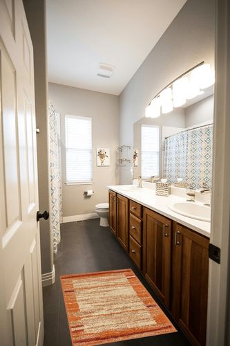 Alair Abstract Terracotta Area Rug Wade Logan Rug Size: Rectangle 2' x 3' in Wooden and Grey Bathroom