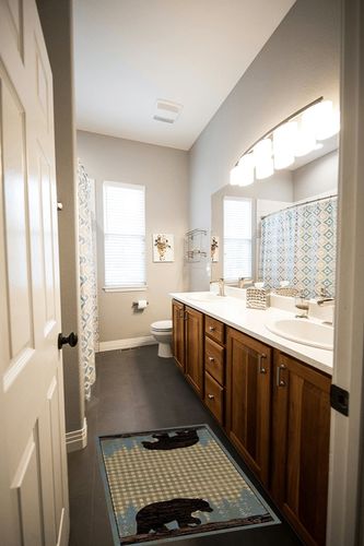 Mayberry Rugs Ashland Area Rug, 2'3"x3'3", Blue in Wooden and Grey Bathroom