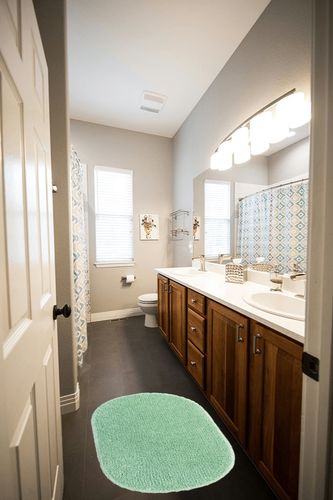 YIRDDEO Sage Green Pom Bath Rug for Bathroom Non Slip, Cute Boho Pom Oval Absorbent Shower Mat, Plush Soft Washable Rug (20" x 30") in Wooden and Grey Bathroom