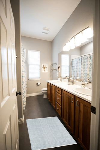 Dash and Albert Herringbone Swedish Blue Handwoven Cotton Rug, 2 X 3 Feet, Blue Geometric Pattern in Wooden and Grey Bathroom