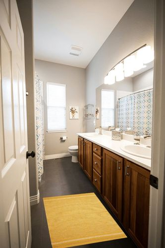 DII Variegated Recycled Yarn Modern Edge Stripe, 2x3', Honey Gold in Wooden and Grey Bathroom