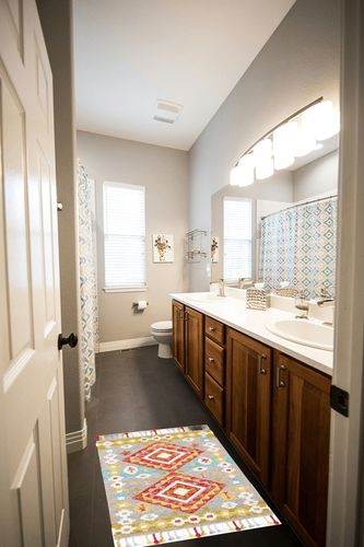 SAFAVIEH Aspen Collection Accent Rug - 2' x 3', Grey & Red, Handmade Boho Diamond Braided Tassel Wool, Ideal for High Traffic Areas in Entryway, Living Room, Bedroom (APN119F) in Wooden and Grey Bathroom