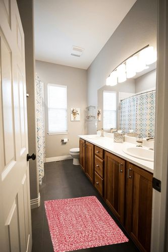 Super Area Rugs Farmhouse Braided Rug Cotton Kitchen Reversible Carpet, Red & White, 2' X 3' Rectangle in Wooden and Grey Bathroom