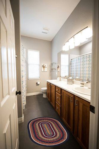 VHC Brands Stratton Jute Oval Rug 20x30 Country Braided Flooring, Navy and Red in Wooden and Grey Bathroom
