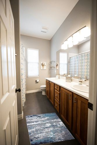 Rugshop Distressed Abstract Watercolor Area Rug 2' x 3' Blue in Wooden and Grey Bathroom