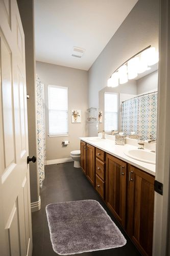 Mohawk Home Goliath Machine Washable Bath Mat 20" x 34" Grey Flannel in Wooden and Grey Bathroom