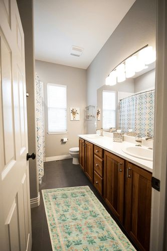 Rifle Paper Co. x Loloi Eden Collection EDE-01 Mughal Rose Moss 2'-0" x 5'-0" Accent Rug feat. CloudPile in Wooden and Grey Bathroom