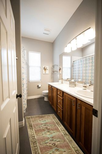 Loloi Magnolia Home by Joanna Gaines x Sinclair Clay/Tobacco 2'-0" x 5'-0" Accent Rug in Wooden and Grey Bathroom
