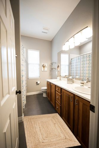 Natural By Natural Farmhouse Reversible Kitchen Area Rug in Wooden and Grey Bathroom