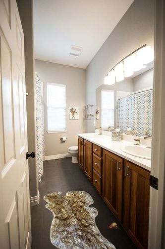 Hand Made, Brown Wolf Rug, Coyote Fur, Shag Pelt, Faux Flokati Bear Skin, Sheepskin, Throw Rug, Suede Lined in Wooden and Grey Bathroom