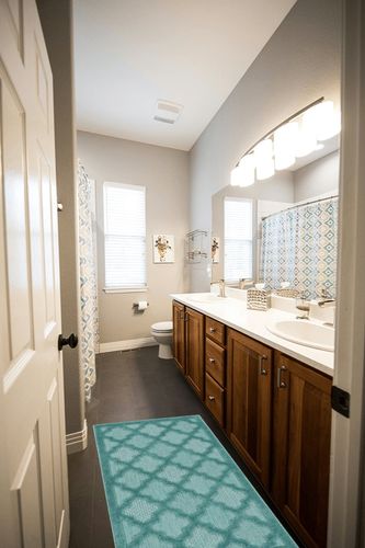 Nourison Easy Care Indoor/Outdoor Aqua/Teal 2' x 4' area-rug, easy-clean, Non Shedding, Bed Room, Living Room, Dining Room, Kitchen (2x4) in Wooden and Grey Bathroom