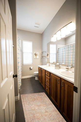 Loloi Chris Loves Julia x Loloi Jules Collection JUL-04 Tangerine/Mist 2'-3" x 3'-9" Accent Rug in Wooden and Grey Bathroom