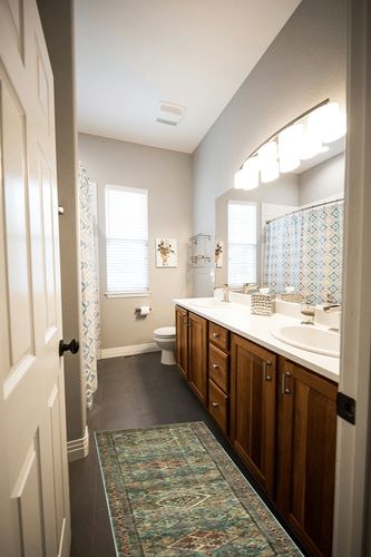 Loloi Magnolia Home by Joanna Gaines x Sinclair Turquoise/Multi 2'-3" x 3'-9" Accent Rug in Wooden and Grey Bathroom