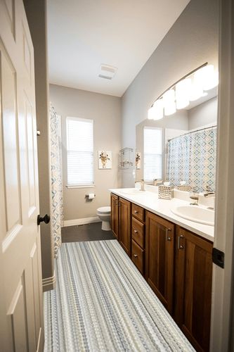 Garland Rug Carnival Stripe 3 ft. x 8 ft. Random Earth Tone Runner Rug in Wooden and Grey Bathroom