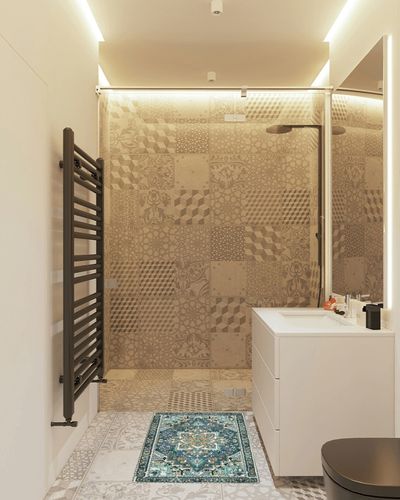 Lahome Blue Medallion Oriental Area Rug in White Tiled Bathroom