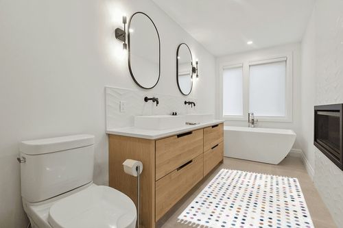 Filson Polka Dots Beige Area Rug Mack & Milo Rug Size: Rectangle 4' x 6' in Scandinavian Neutral bathroom
