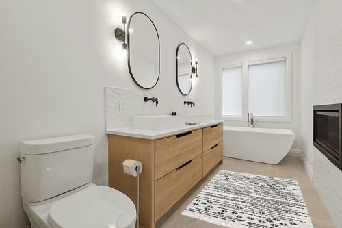 Geometric Ivory/Black Area Rug Union Rustic Rug Size: Rectangle 4'5" x 6'5" in Scandinavian Neutral bathroom