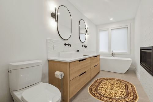 Unique Loom Voyage Collection Area Rug - St. Louis (4' 1" x 6' 1" Oval Cream/Brown) in Scandinavian Neutral bathroom