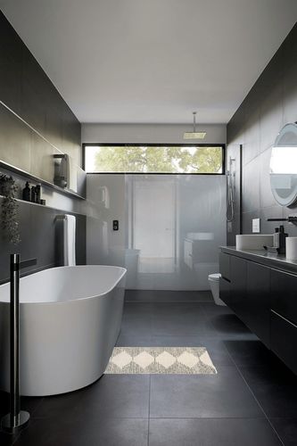 nuLOOM Sadie Moroccan Diamond Tassel Shag Accent Rug in Black Modern Bathroom