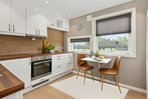 Ayjah Cream Modern Geometric Area Rug Wade Logan Rug Size: Rectangle 4'4" x 6' in Wood and White Small Kitchen