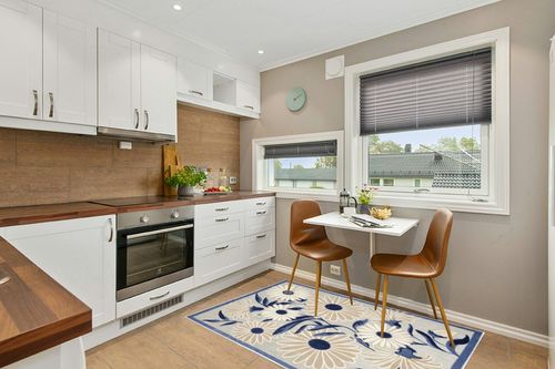 HomeRoots 4' X 6' Blue and Grey Floral Stain Resistant Non Skid Area Rug in Wood and White Small Kitchen