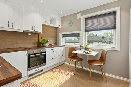 Ivy Bronx Niki Dip Dyed Ivory/Terracotta Area Rug; 3' x 5' in Wood and White Small Kitchen
