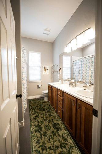 SAFAVIEH Antiquity Collection 2'3" x 12' Olive / Green AT824A Handmade Traditional Oriental Premium Wool Runner Rug in Wooden and Grey Bathroom