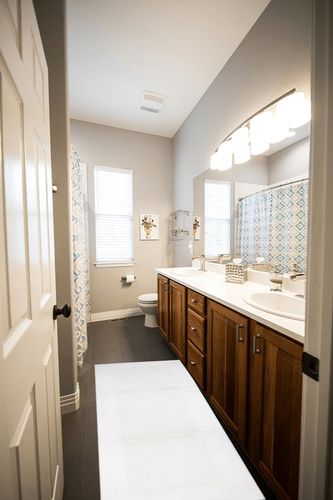 Hotel Style White Egyptian Cotton 24 inch x 60 inch Bath Runner in Wooden and Grey Bathroom