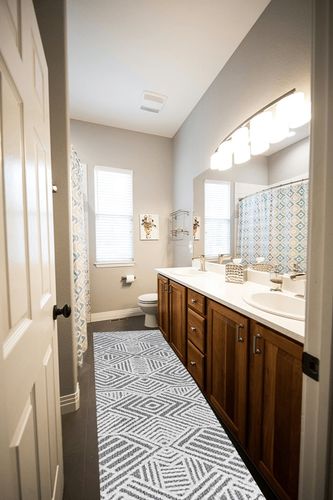 Jordan High-Low Pile Art Deco Geometric Indoor Outdoor Area-Rug in Wooden and Grey Bathroom